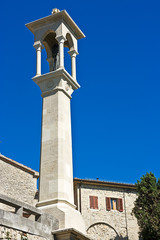 Obelisk with a sculpture of the sacred. San Marino.