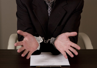 businessman with handcuffs