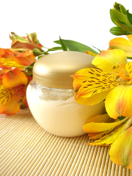 cosmetic moisturizing cream with flowers