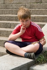 boy with the toy lizard