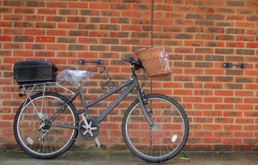 Fototapeta na wymiar Bike against brick wall