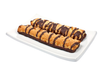 Two chocolate cakes on a dish