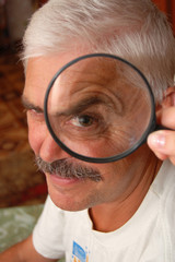 Man and magnifier