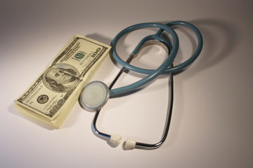 stethoscope and money (healthcare costs)