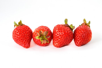 Big red strawberry against white background