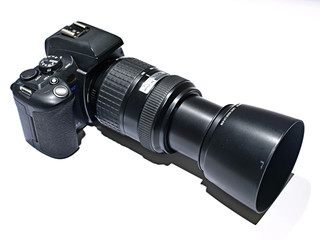 Camara fotografica con Teleobjetivo.