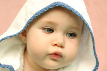 portrait of a baby with hood