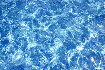 Obraz premium Bright blue water background