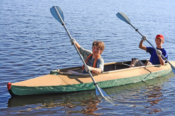 Two boys on a kayak