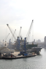 freight ship being loaded with aggregate