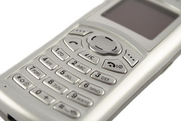 Silver cell phone on white background