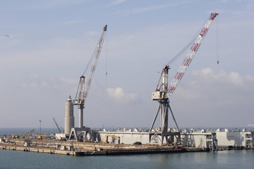 Fototapeta na wymiar loading cranes on dockside