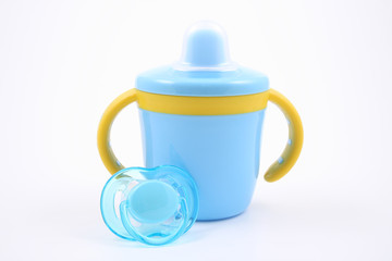 baby cup and pacifier