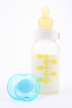 bottle of milk and pacifier