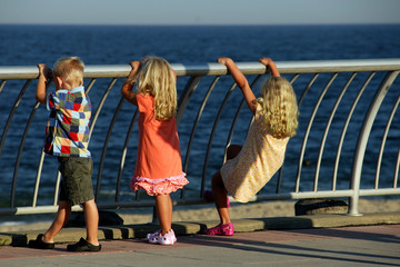 Three Kids looking out to Sea