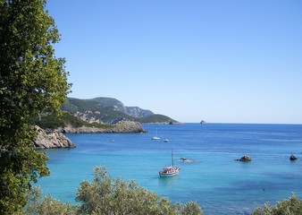 Obraz premium The Greek Isles - Boats in an Isles Cove