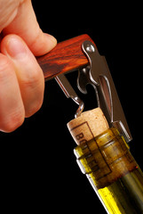 Opening a wine bottle