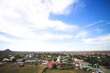 Blue sky over a dry desert town