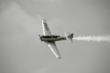 Vintage WW II assault fighter airplane performing at airshow