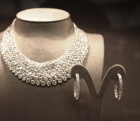 Sparkling Diamond Necklace and Pair of Earrings