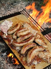Roast meat - delicious dinner and sausage