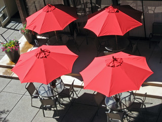 Four Red Umbrellas on A Patio