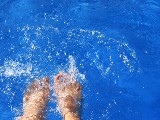 Feet over a pool