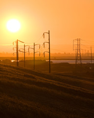 Sunset and electric lines