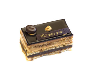 Chocolate and coffee dessert piece of cake isolated on white