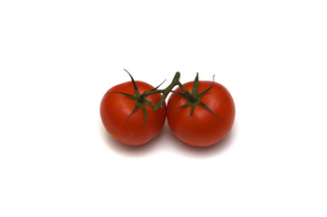 Two fresh healthy tomatoes on one branch isolated on white