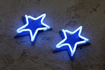 neon stars from hotel sign