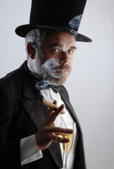 man with glass and cigar