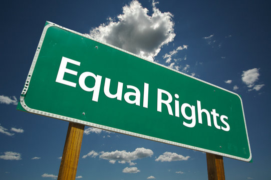 Equal Rights Road Sign With Blue Sky And Clo