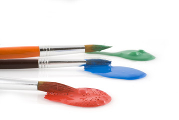 Obraz premium Three colors with brushes