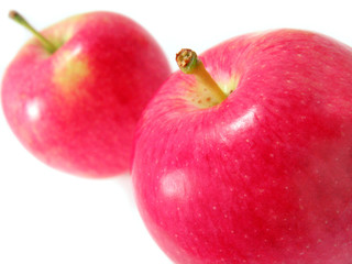 two red apples isolated on white