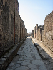 Fototapeta na wymiar Ancient Roman wąskiej drodze w Pompejach