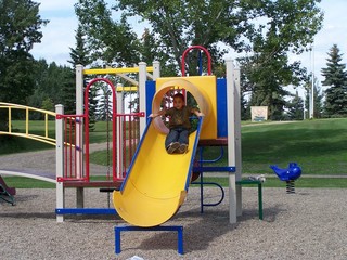 playground slide fun for little boy