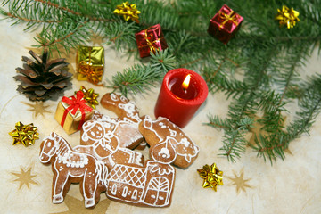 Fototapeta na wymiar Christmas still life with candlelight and gingerbread