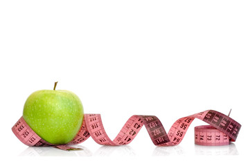 Apple and measuring tape