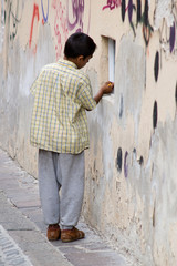 Obraz na płótnie Canvas Chłopiec na ścianę