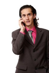 emotional businessman talking by mobile phone. on white