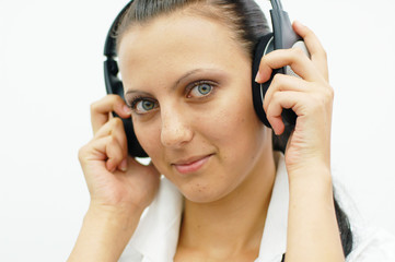 Fototapeta premium brunette girl listening music with headphones