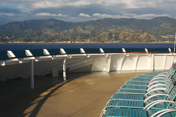 Cruise ship deck abstract shot with deck chairs