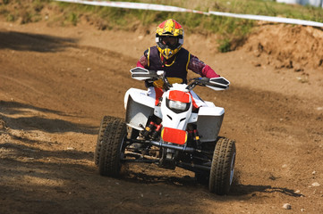 Young man on quadbike. © Norbert Judkowiak