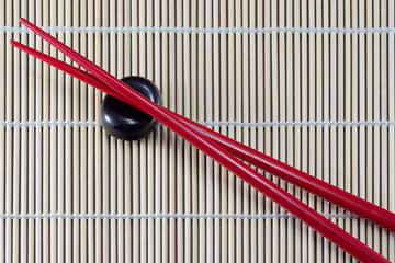 Chopsticks on bamboo.