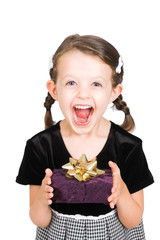 little girl excited to receive gift, isolated over white