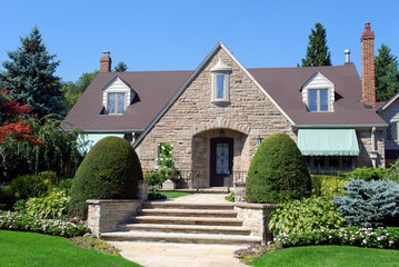House with dormers and large stone gable