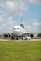 DC-10 jet with missing engines towed for dismantling