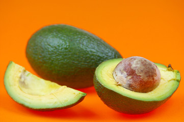 Avocado isolated on orange