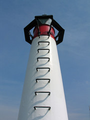 Small lighthouse in a port